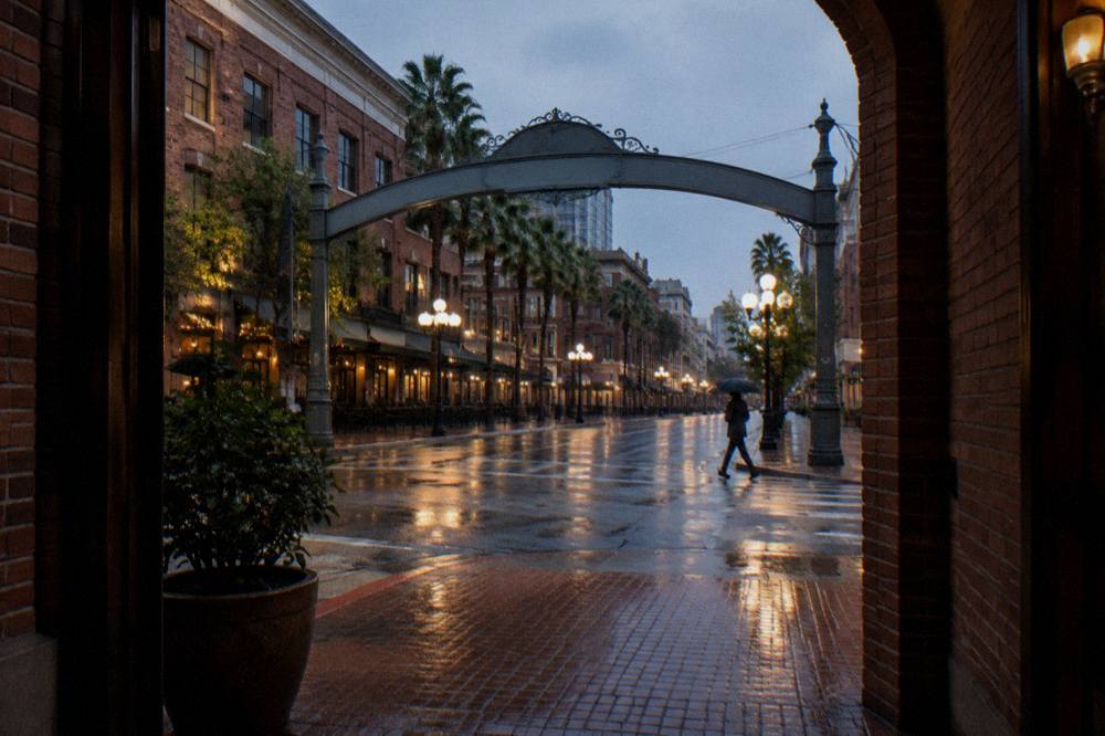 the Gaslamp Quarter arch sign spanning Fifth Avenue in the evening