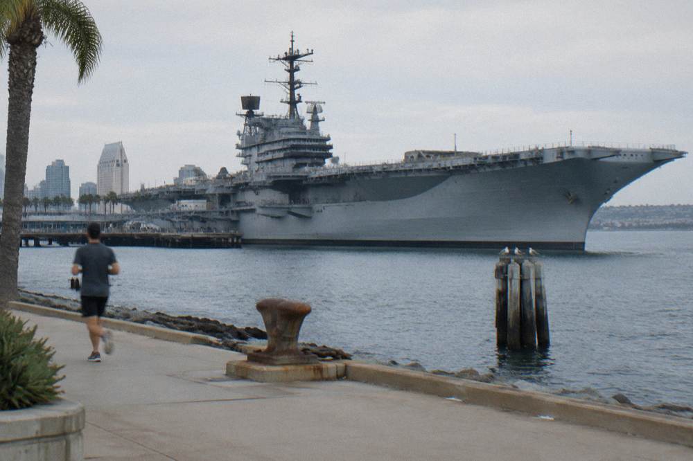 the USS Midway aircraft carrier moored along the San Diego waterfront
