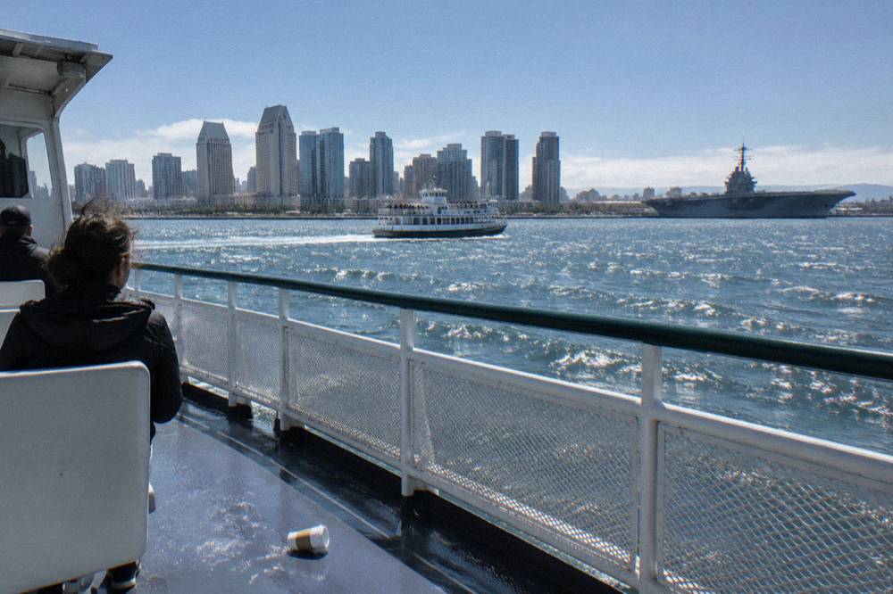 A ferry crossing San Diego Bay toward Coronado in clear weather