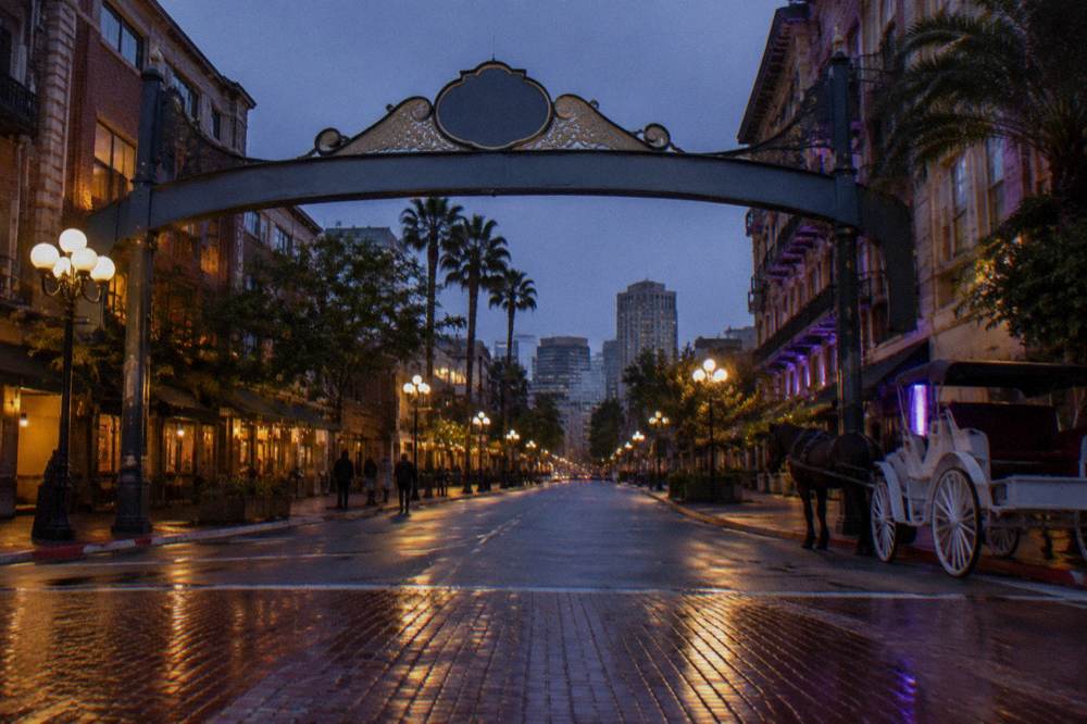 The Gaslamp Quarter Arch sign spanning Fifth Avenue in downtown San Diego