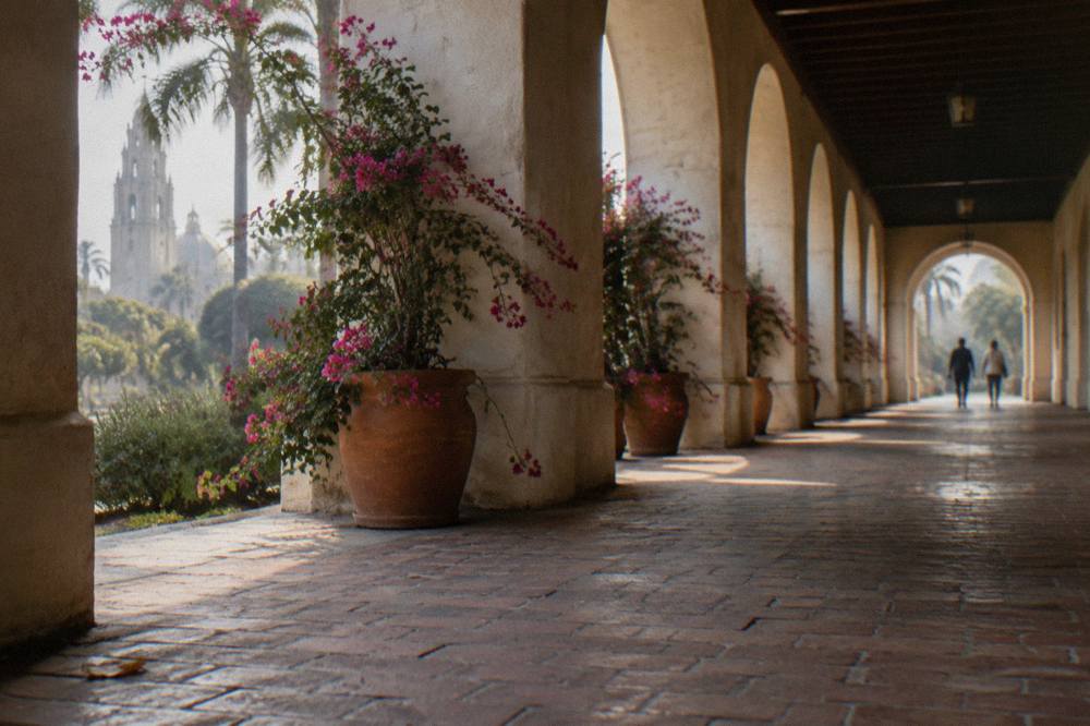 Museum colonnade and gardens along a Balboa Park walkway