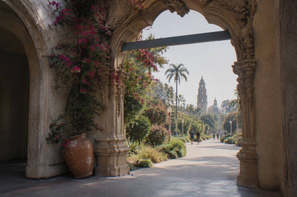 Ornate archway and garden walkway in Balboa Park