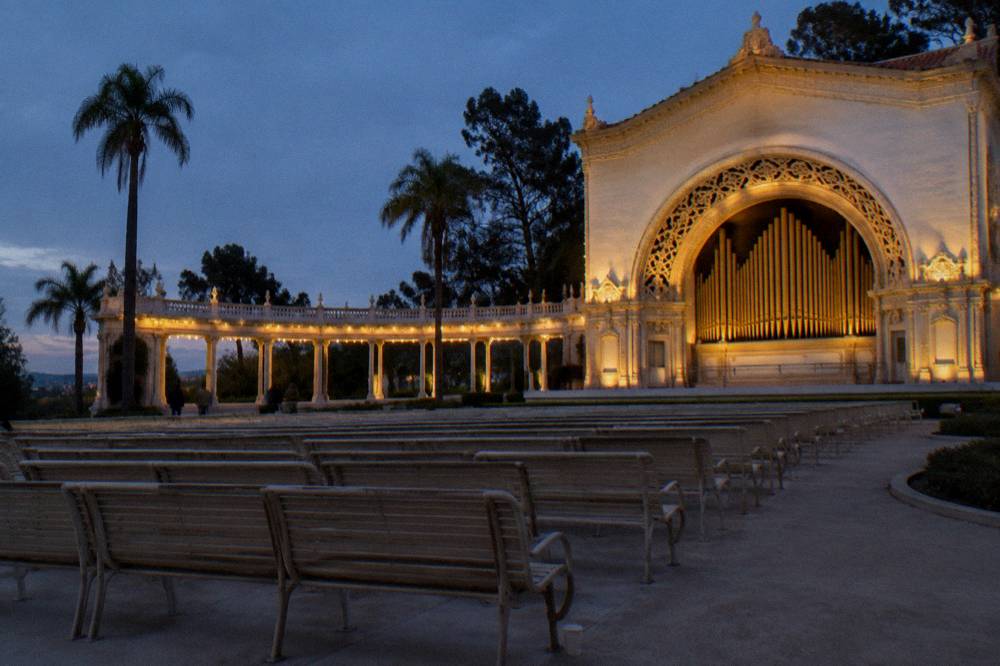 The Spreckels Organ Pavilion decorated with lights for a December evening concert