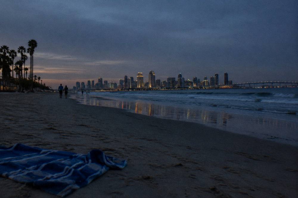 The downtown San Diego skyline across the bay seen from Coronado at twilight